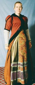 The gown works equally well without a farthingale. The stiff layer of additional lining around the bottom third of the inside of the kirtle, combined with the layer of velvet guarding around the bottom edge, gave a lot of body to the bottom of the skirts.