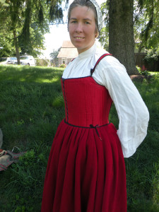 The petticoat is bound with a narrow band of black silk taffeta at the waist. It sits about an inch lower than my natural waist; I find this most comfortable when wearing it with jackets.